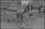 Boys riding bicycles [Knokke, Belgium?]