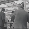 Cameraman filming on ferry. New York, NY