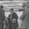 Cameraman filming on ferry. New York, NY