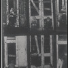 Children in the windows of an abandoned building