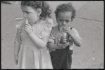 Children eating and drinking