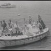 Young men on sailboat
