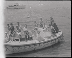 Young men on sailboat