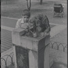 Dog drinking from water fountain