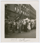 Members of the International Labor Defense and a group carrying a Soviet labor banner at a Scottsboro protest march, held in Harlem, New York