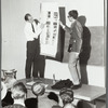  Ken Dewey and student examining chart with patterns as part of "Capture the Flag" happening at Jyväskylä, Finland