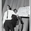 Ken Dewey speaking as student holds up map as part of "Capture the Flag" happening at Jyväskylä, Finland