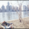 Ken Dewey and Leil Downdes picnicking against view of river