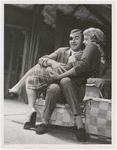 Nigel Davenport and Angela Lansbury (embracing on chair) in the stage production A Taste of Honey