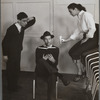 Unidentified man, Ken Dewey, and Graciela de Majo performing the production Close Up Shot