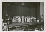 Cuban anthropologist Fernando Ortiz presenting a Luluyonkori troupe of Cuban Black and mixed-race singers, dancers and drummers to demonstrate the African cultural traits in the Black population of Cuba, before a White audience in Havana, Cuba, May 30, 1937