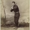 Unidentified baseball player in dark uniform - batting form