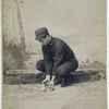 Unidentified baseball player in dark uniform - catching form - squat