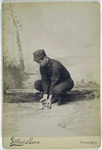 Unidentified baseball player in dark uniform - catching form - squat