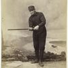 Unidentified baseball player in dark uniform - batting form