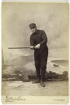 Unidentified baseball player in dark uniform - batting form