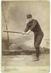 Unidentified baseball player in dark uniform - batting form