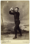 Unidentified baseball player in dark uniform - catching form