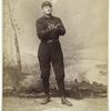 Unidentified baseball player in dark uniform - catching form