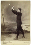 Unidentified baseball player in dark uniform - catching form