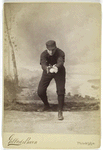 Unidentified baseball player in dark uniform - catching form