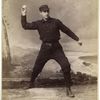 Unidentified baseball player in dark uniform - throwing form