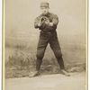 Unidentified baseball player in dark uniform - catching form