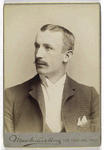 Unidentified man with mustache - wearing a suit - portrait