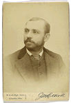 Unidentified man with mustache and whiskers- wearing a suit - portrait