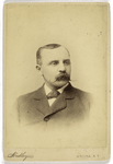 Unidentified man with mustache - wearing a suit and bow tie - portrait