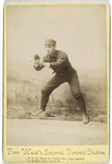 Unidentified baseball player in dark uniform - catching form