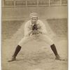 Unidentified baseball player in catching form]