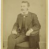 Unidentified man with mustache, wearing a suit and bow tie - portrait.