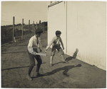 Fig. 2: Two boys with a ball, playing Hand Ball
