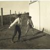 Fig. 3: Two boys with a ball and bat, playing Barn Ball