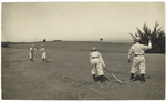 Fig. 3: Two boys with a ball and bat, playing Barn Ball