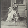 Mrs. Elizabeth Stuart Phelps Ward on the porch of her suburban home...