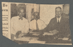 Three seated men
