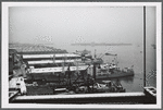 View of the Brooklyn piers and Governors Island from the Brooklyn Bridge