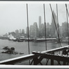 View of lower Manhattan as seen from Brooklyn Bridge on a dreary winter day