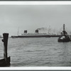 The Liberte, outward bound, passing the Battery in Manhattan