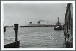 The Liberte, outward bound, passing the Battery in Manhattan