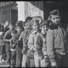 Boys on line in street
