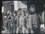 Boys on line in street
