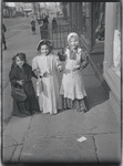 Three costumed children