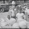 Children with cabbage vendor