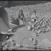Children at play in debris