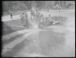 Children playing in a sprinkler