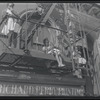 Woman and children on fire escape