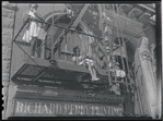 Woman and children on fire escape